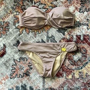 Victoria’s Secret bandeau top 2 piece swimsuit.  In blush color with gold.